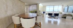 South Coogee vacation rental, dining table ocean view, lounge beyond